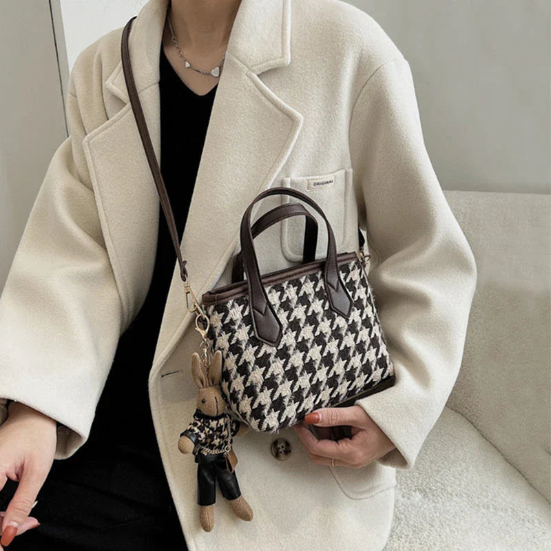 Stylish houndstooth shoulder bags in various colors, featuring a spacious square shape, adjustable strap, and classic checkerboard pattern.