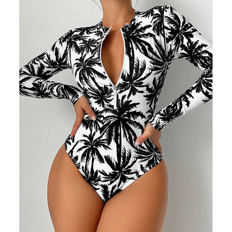 Women's one-piece printed swimsuit in blue with polyester and spandex lining, sizes S to XL.