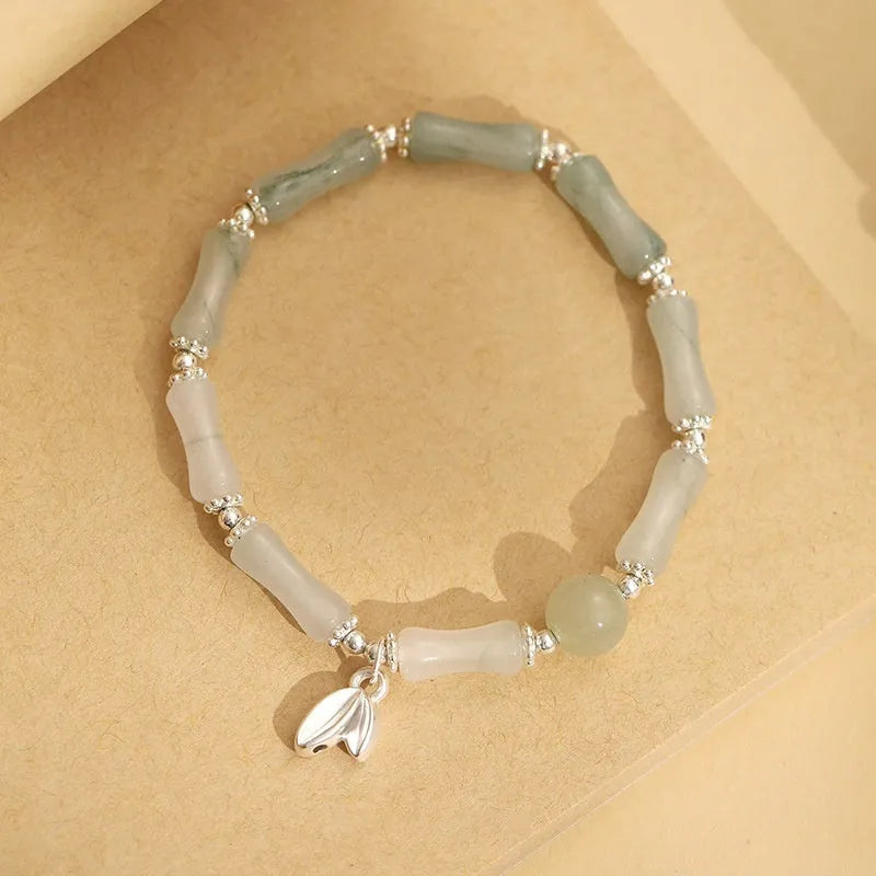 Handcrafted antique style sterling silver bracelet with Tianshan green bamboo centrepiece for women.