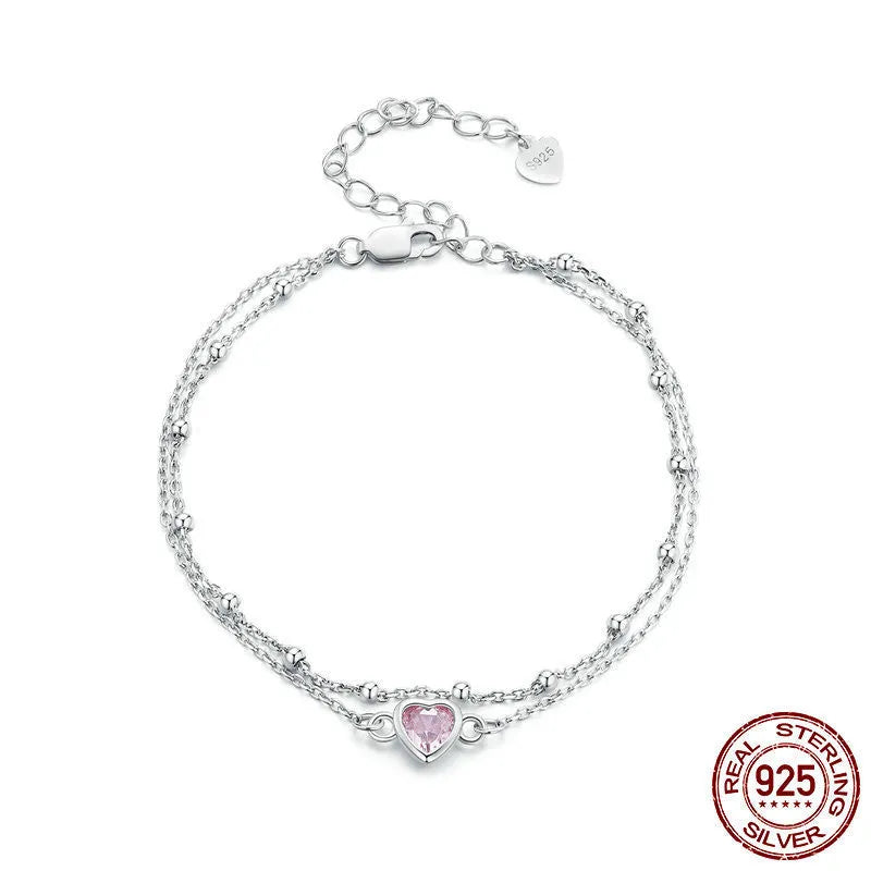 Sterling silver bracelet with heart pendant on adjustable chain