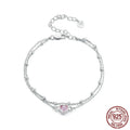 Sterling silver bracelet with heart pendant on adjustable chain