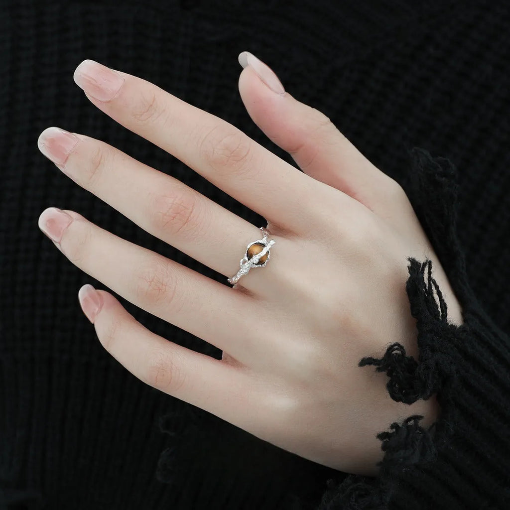 Adjustable Saturn open ring for women with white gold electroplated finish on silver