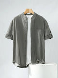 Men's loose fit short-sleeved linen blend shirt in a solid colour with a stand collar