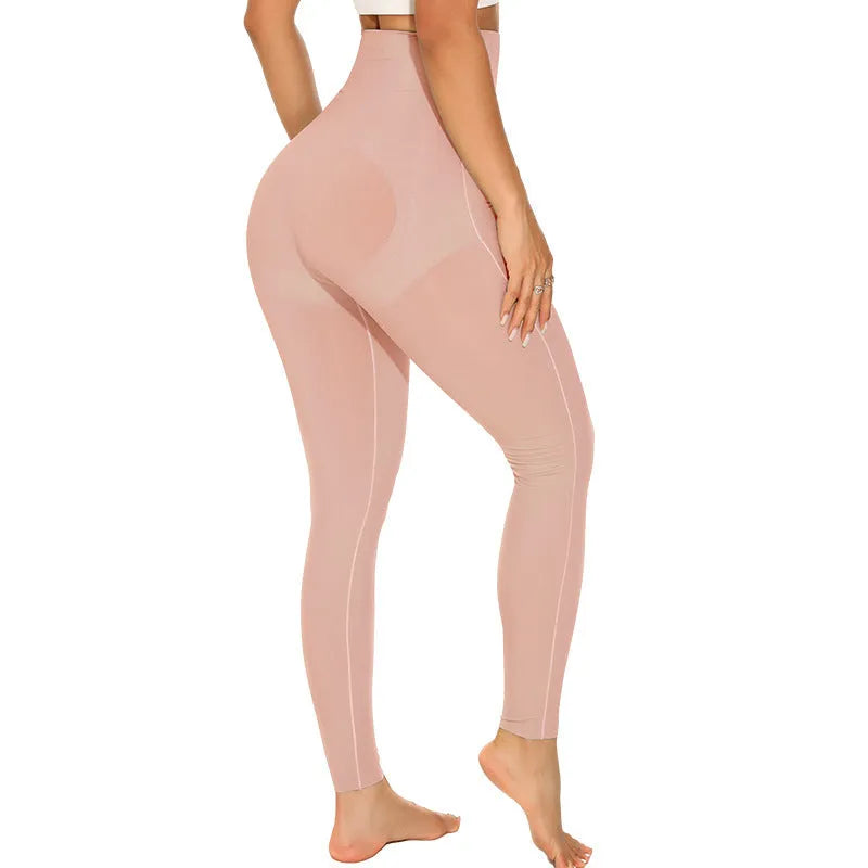 Women's black belly contracting yoga trousers with seamless design and lumbar support