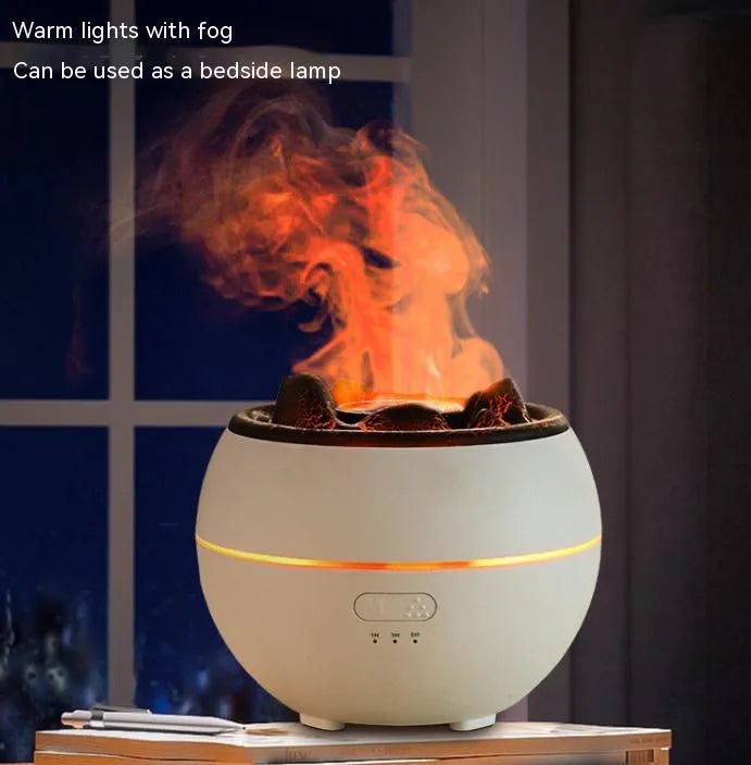 White round desk aromatherapy humidifier and essential oil diffuser with water tank on a wooden table.