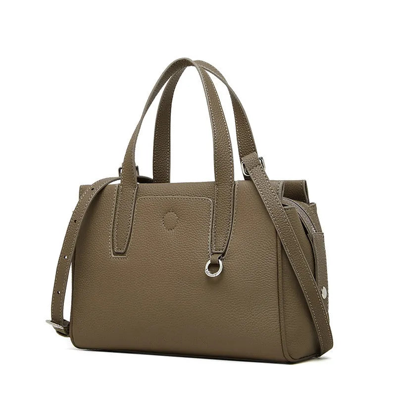 Genuine leather cowhide crossbody bag in horizontal square suitcase shape