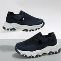 Women's mesh sport shoes with round toe, low heel, and Velcro fastening in a solid colour