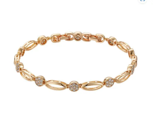 Golden copper hollow carved U-shaped bracelet for women on a plain background.