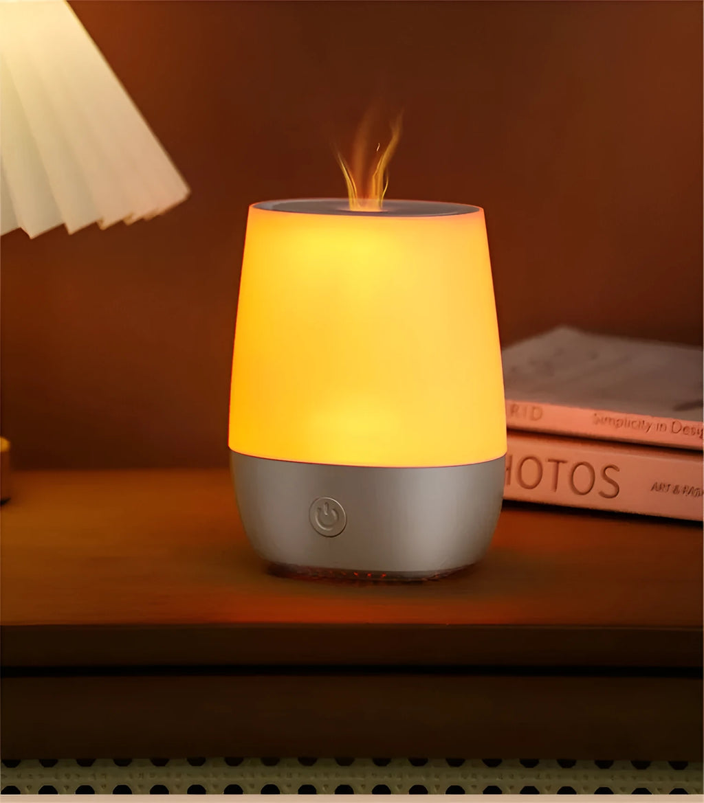 White USB aromatherapy humidifier with simulated flame effect showing 125ml water tank capacity