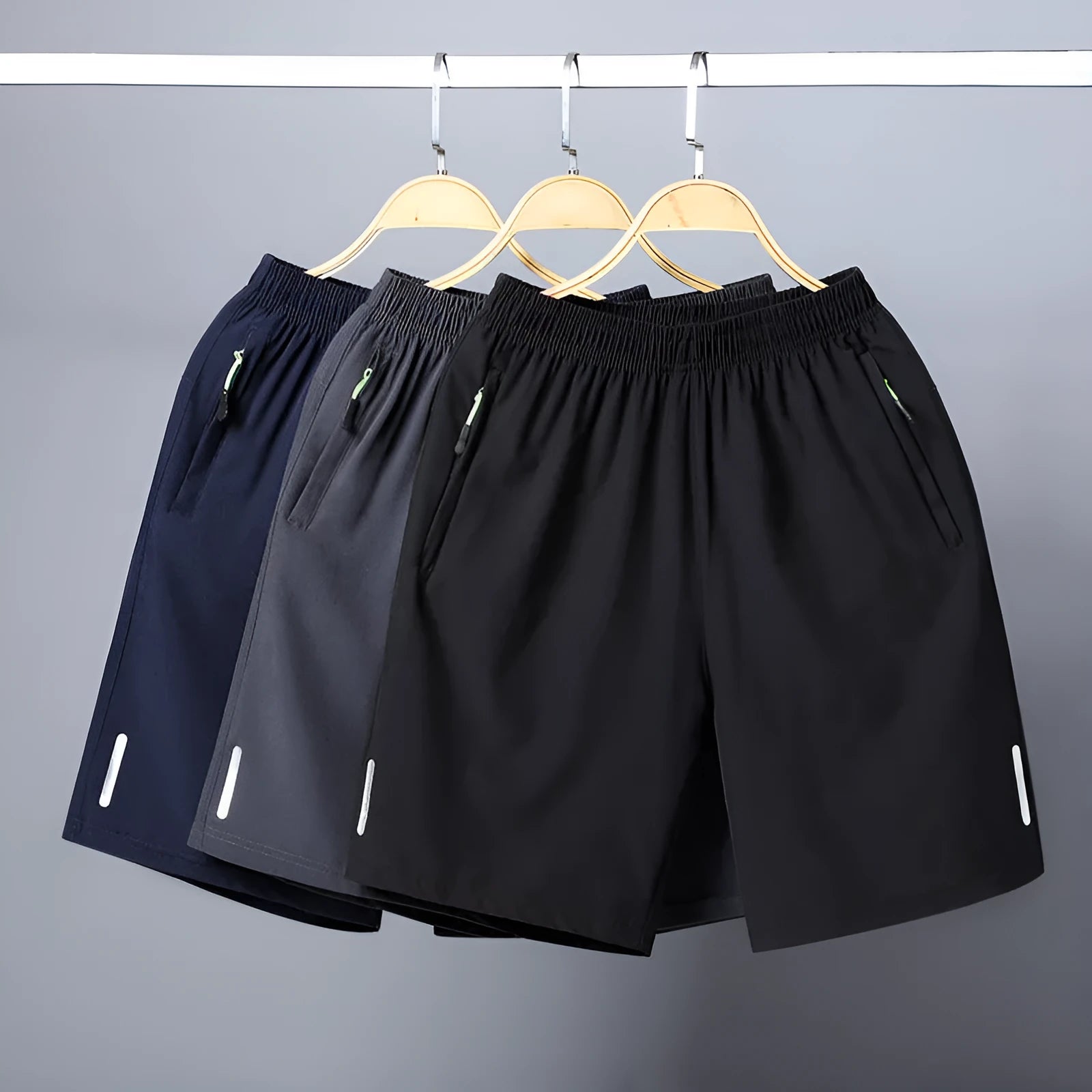 Men's polyester beach casual shorts in solid colour with zippered pocket, Asian sizes M to 8XL, colour Black
