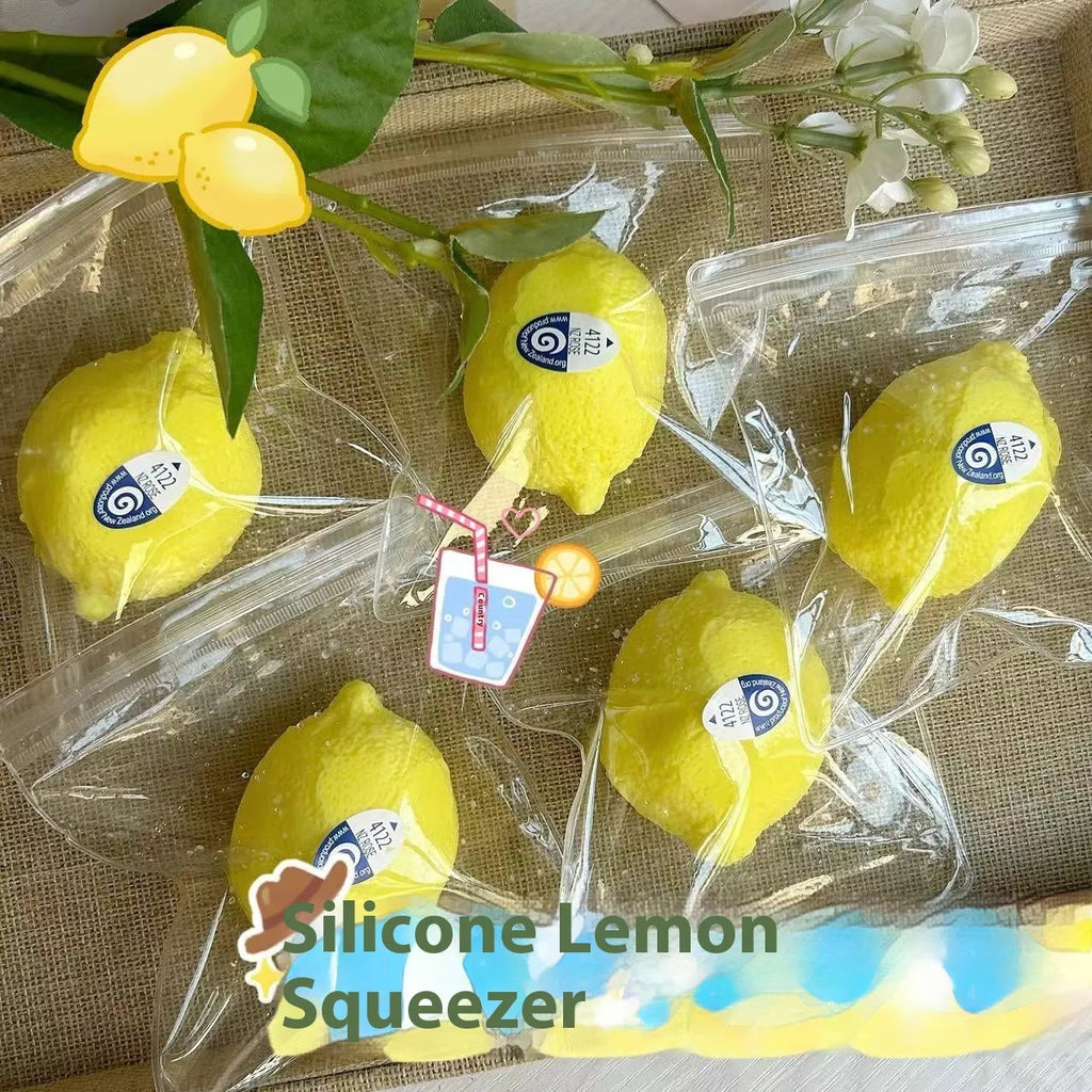 Bright yellow silicone lemon squeezing toy for stress relief and hand training