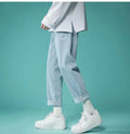 Men's light blue casual straight fit cropped polyester jeans with mid waist and elastic waistband