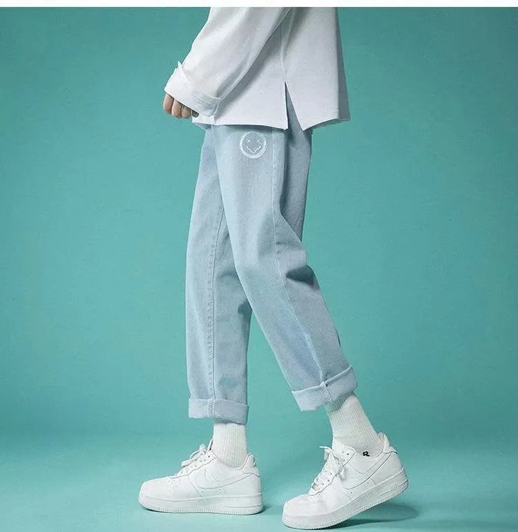 Men's light blue casual straight fit cropped polyester jeans with mid waist and elastic waistband