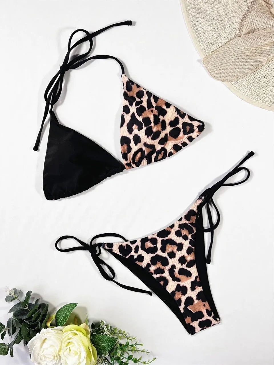 Women's leopard print halter bikini with lace-up front and split-bottom design