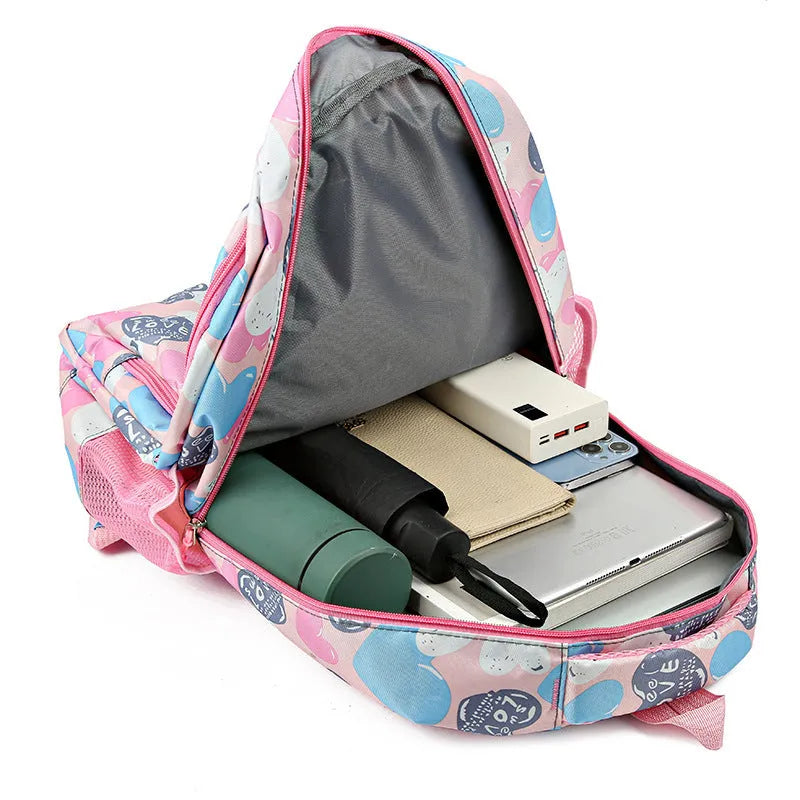Blue student schoolbag with air pillow belt system for back burden alleviation