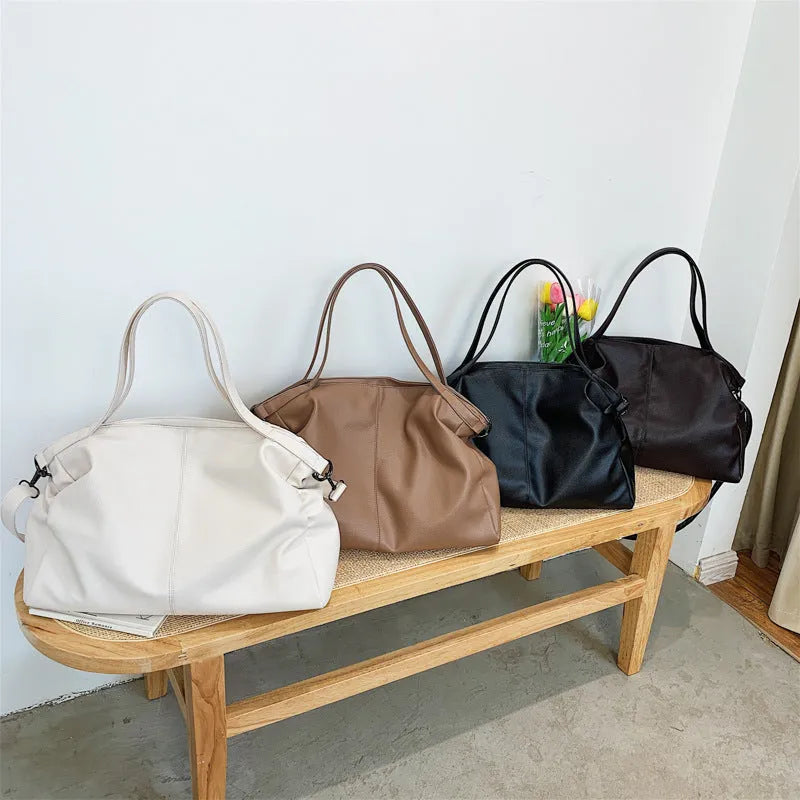 Large soft surface PU messenger tote bag with adjustable shoulder strap and zip opening