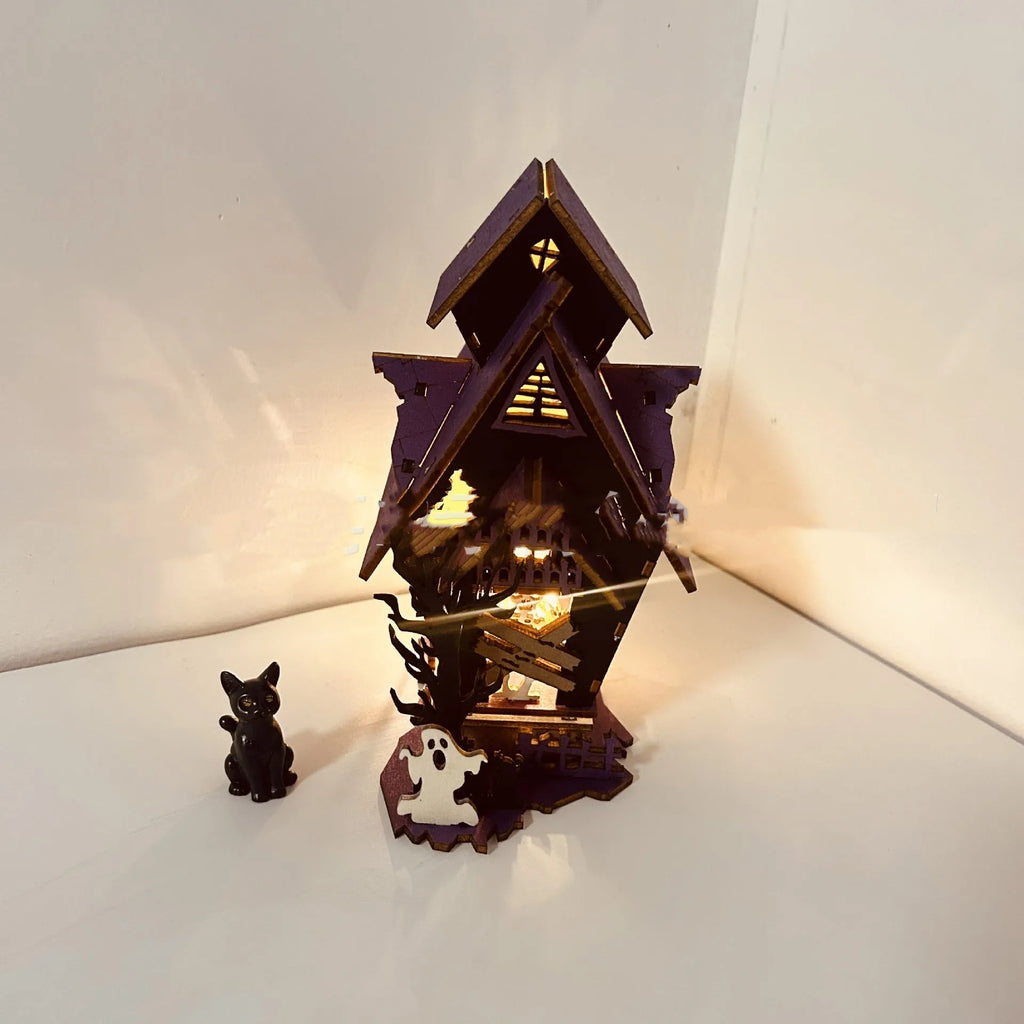 Wooden Halloween haunted house table decoration with candlestick design measuring 14x10.5x19cm
