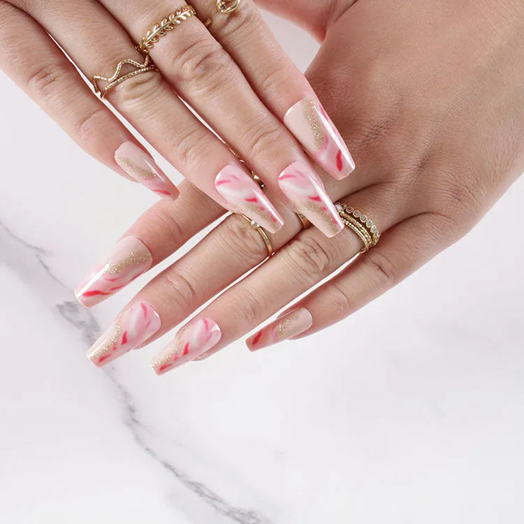 One Second Wearable Manicure press-on nails in blush colour with rose, tulip, and leopard print patterns, medium length