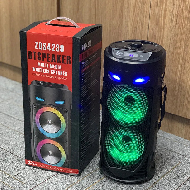 Black portable Bluetooth speaker with dual horn cannon design showing front panel with controls