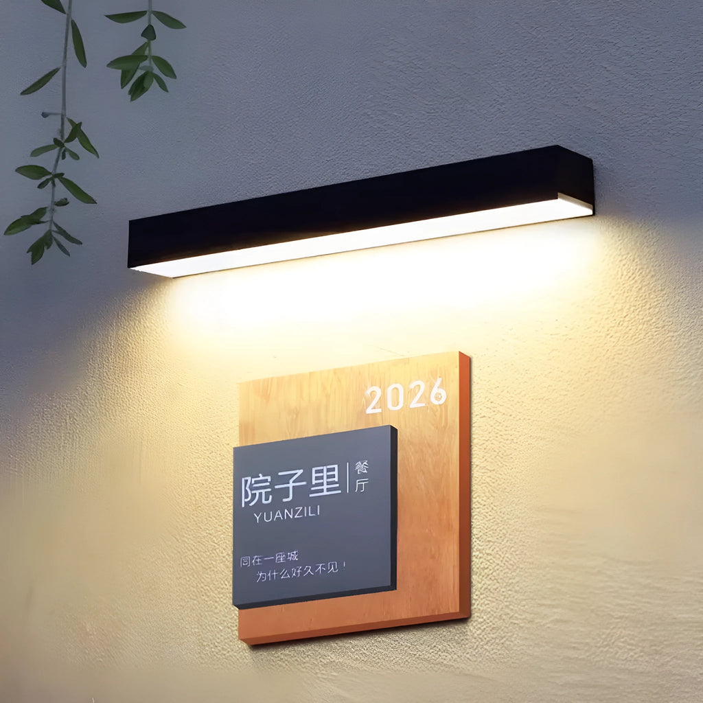 Black solar garden wall light with solar panel and IP65 waterproof rating
