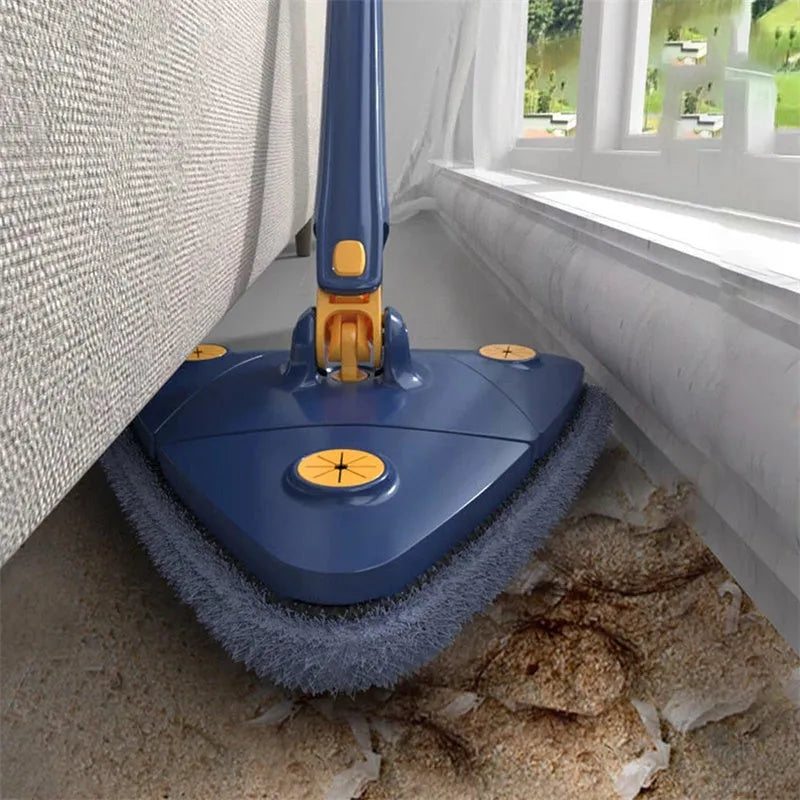 Blue triangle cleaning mop with rotating head and extendable stainless steel pole on tile floor