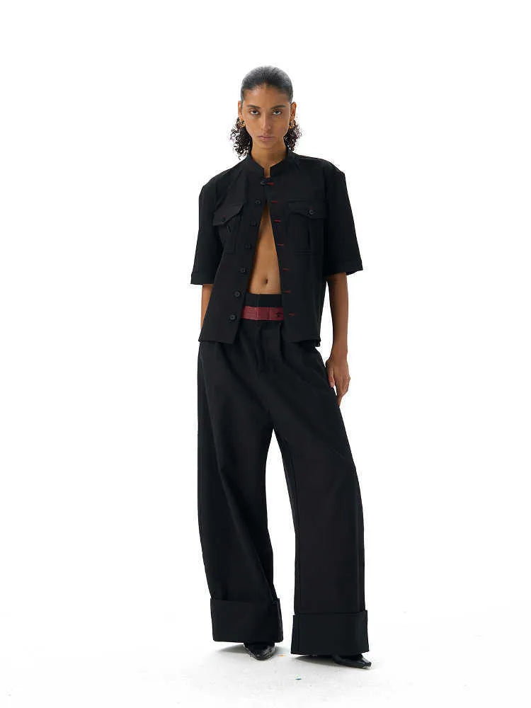 Handmade black loose fit half sleeve men's shirt with a shirt collar.