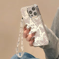 Transparent three-in-one mirror iPhone case with detachable bow bracelet for iPhone 15 Pro Max