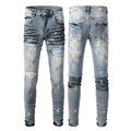 Men's slim fit ripped jeans in light blue with tapered cotton denim, zip fly and double layer belt waist