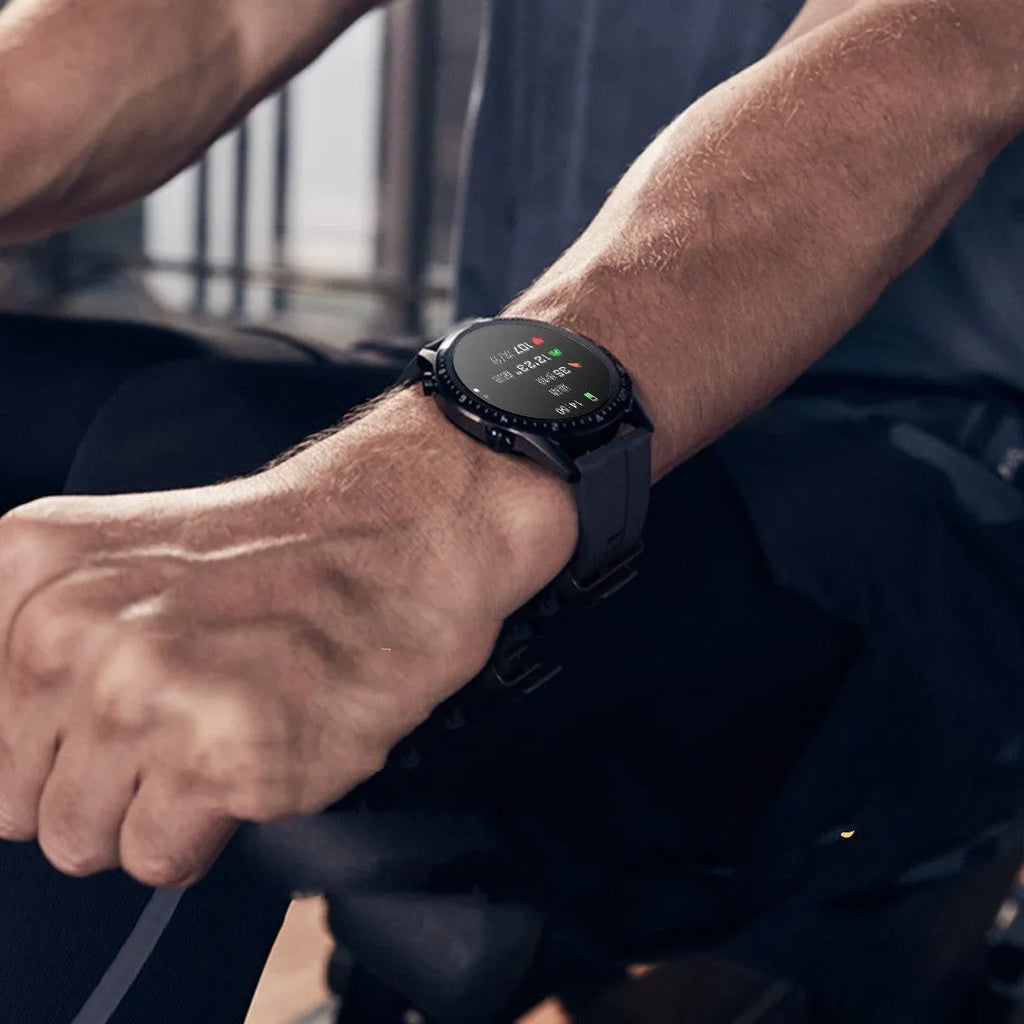 Round smart watch with black aluminium alloy case showing touch screen display with fitness metrics