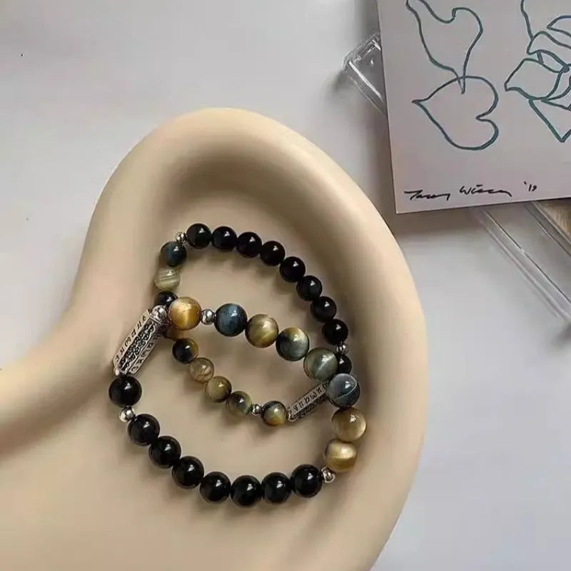 Obsidian and Tigereye sterling silver bracelet with Six Words Mantra engraving, Chinese style geometric design.