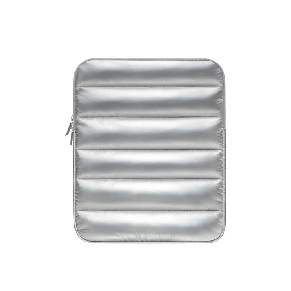 Puff bag laptop sleeve in black showing elastic sides and padded construction for 9.7-11 inch devices