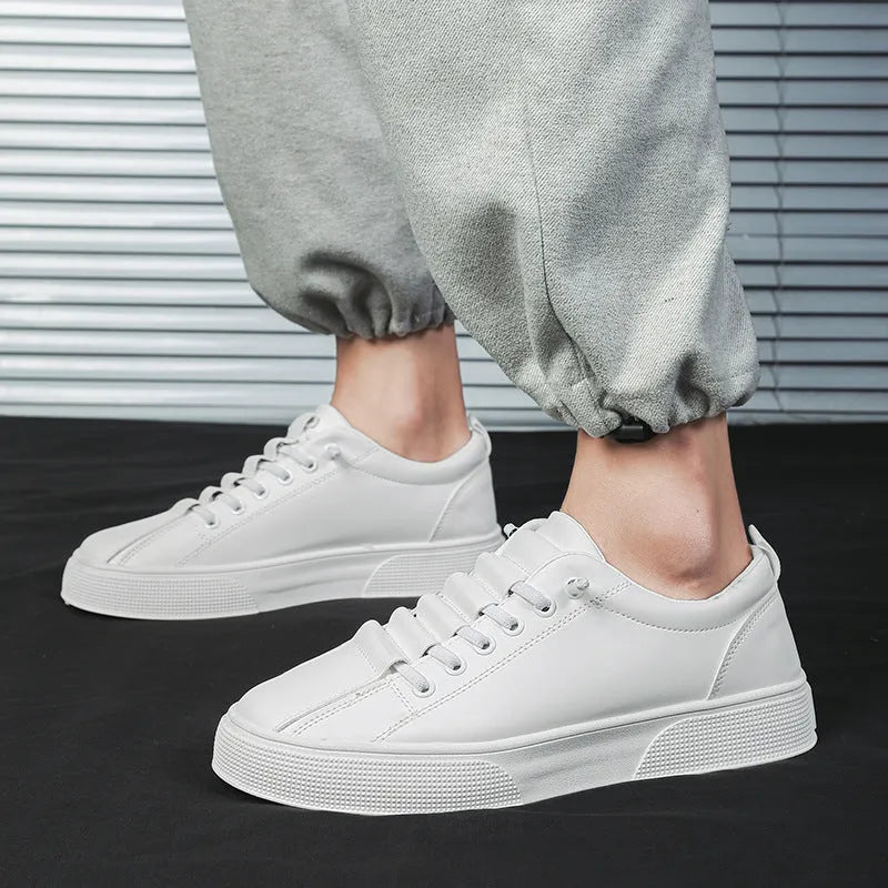 Men's black and white low top mesh sports shoes with synthetic leather upper and round toe design