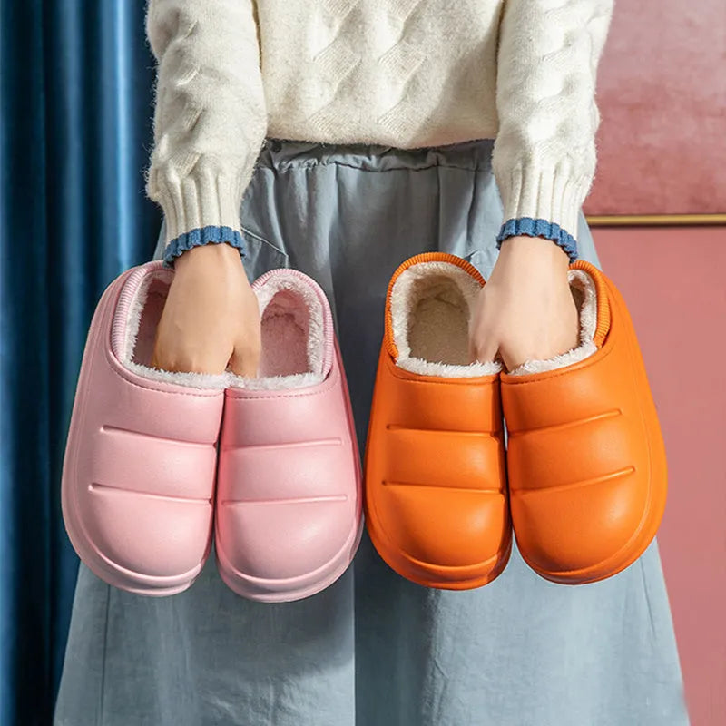Yellow waterproof EVA garden slippers with a plush lining and textured non-slip sole.