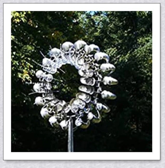 Wind-powered kinetic sculpture with dual-tier blades that spin independently, creating a mesmerizing dance in your backyard