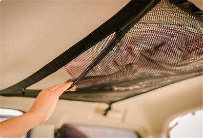 Durable car ceiling cargo storage net with zippered closure, perfect for Kiwi drivers to organize their vehicle's interior