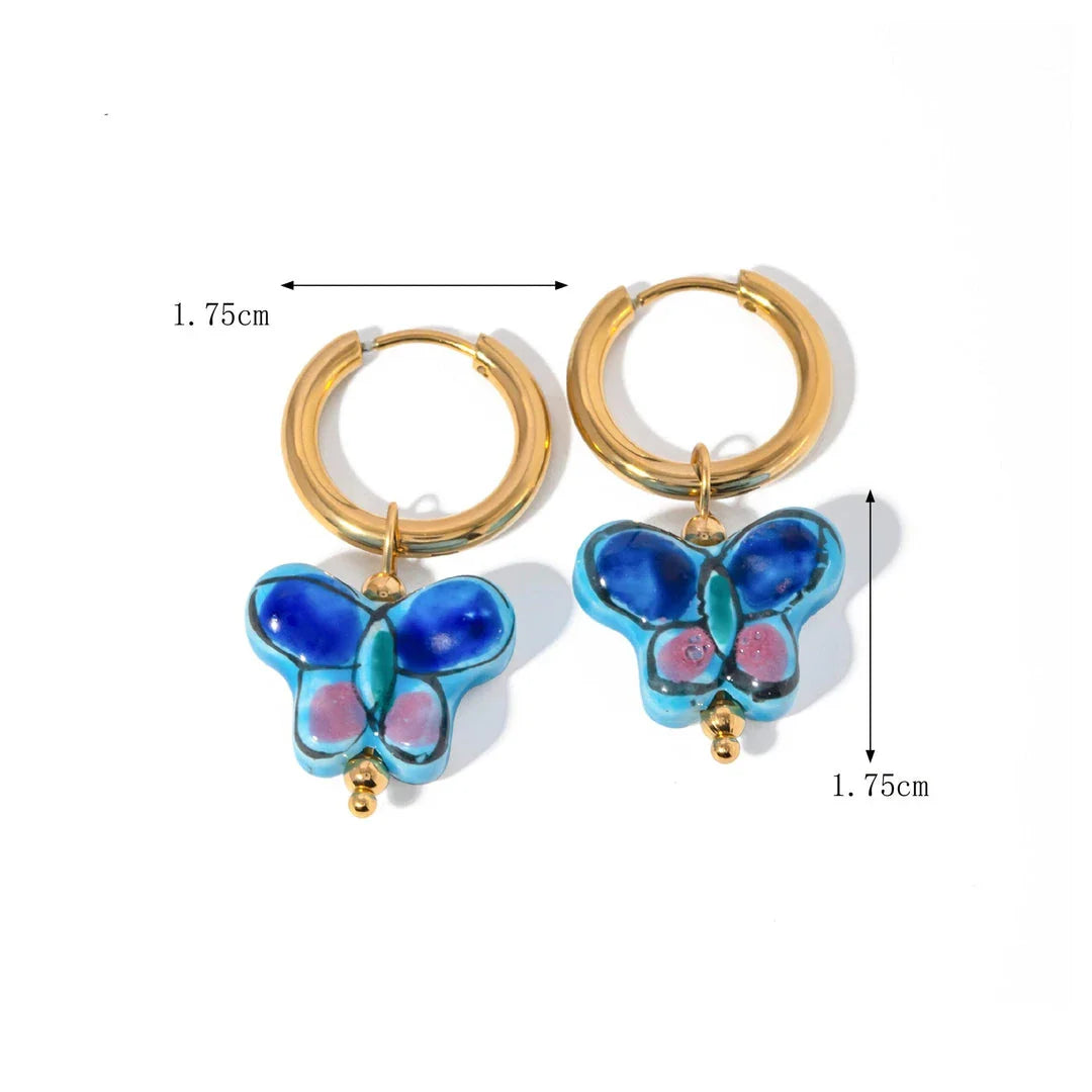 Premium 18K gold plated stainless steel blue flower and butterfly ceramic stud earrings, a stylish accessory crafted in New Zealand