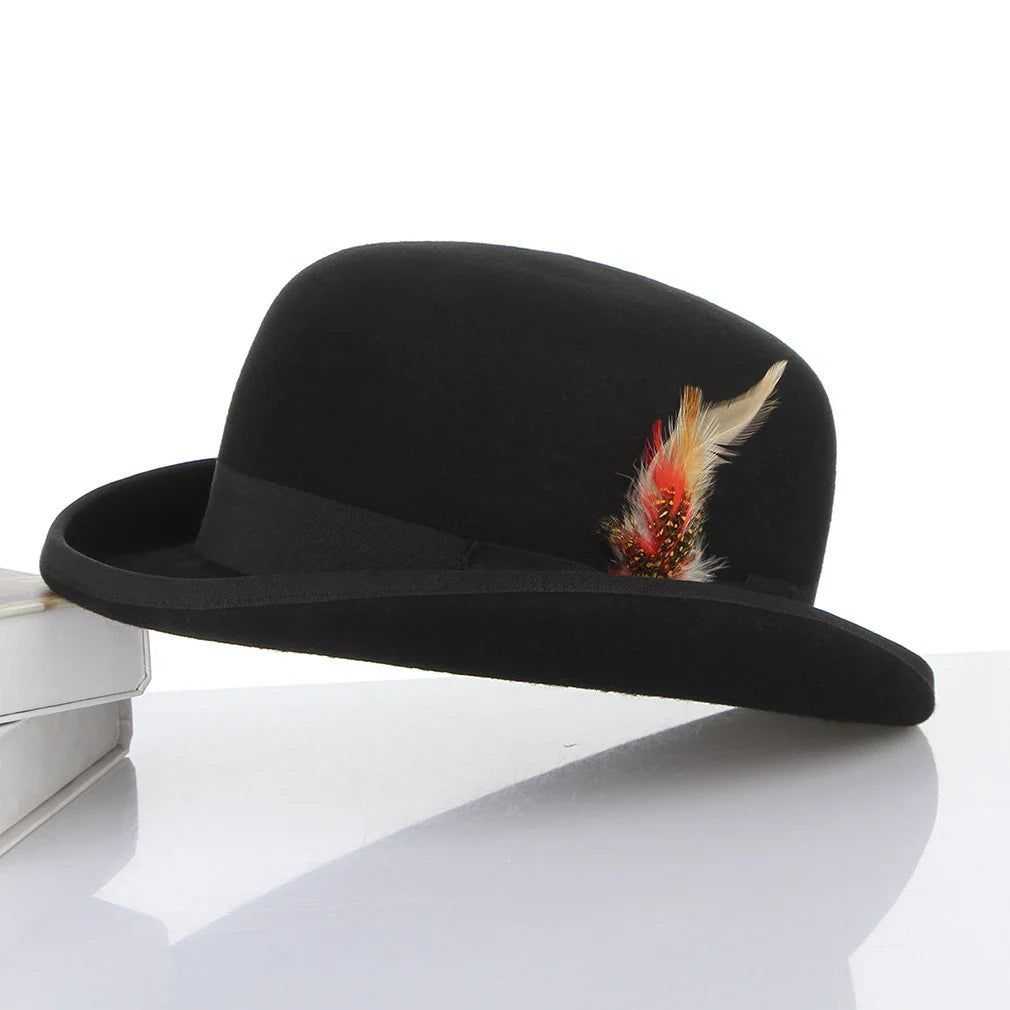 A stylish wool bowler hat with a domed crown and subtle feather trim, a classic British-inspired accessory for keeping warm and looking great in Kiwi winters.