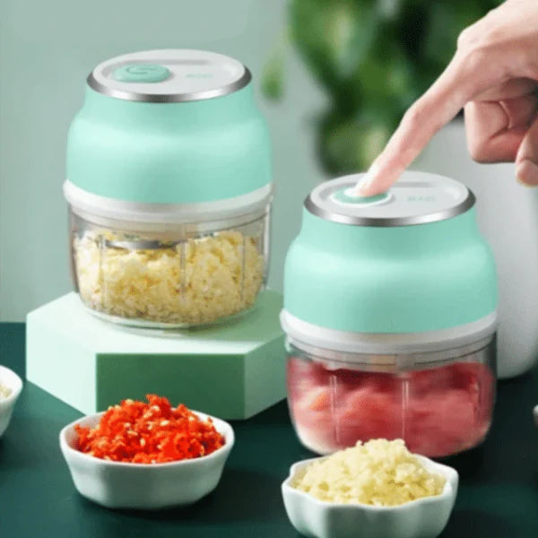 Versatile Electric Food Chopper with stainless steel blades, compact design, and USB-powered operation for efficient chopping and mincing in the kitchen.