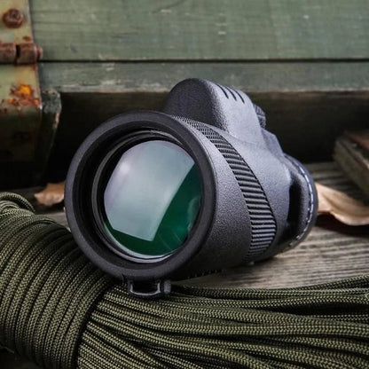 A high-powered 1000X zoom monocular with a 52mm objective lens, waterproof and shockproof design, perfect for outdoor activities like birdwatching, hunting, and hiking.