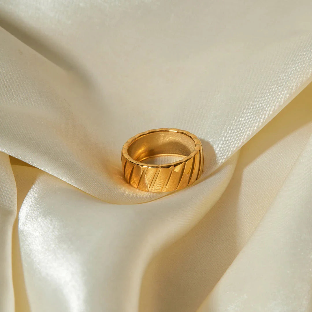 Elegant 18K gold plated ring with a unique hypotenuse pattern design