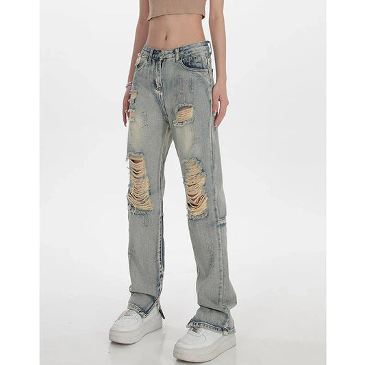 High-waisted ripped straight jeans for women in a vintage-inspired wash with trendy distressed details