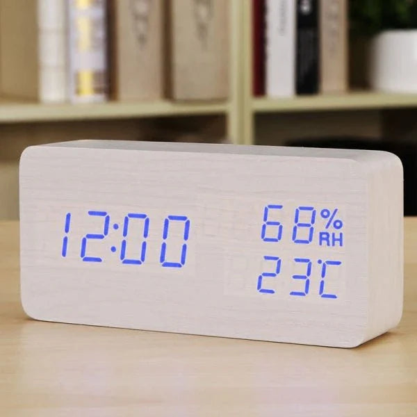 Versatile wooden alarm clock with humidity sensor and silent mode for baby's nursery