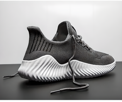 Breathable mesh sneakers in black, grey, and white colors for men's summer comfort and style